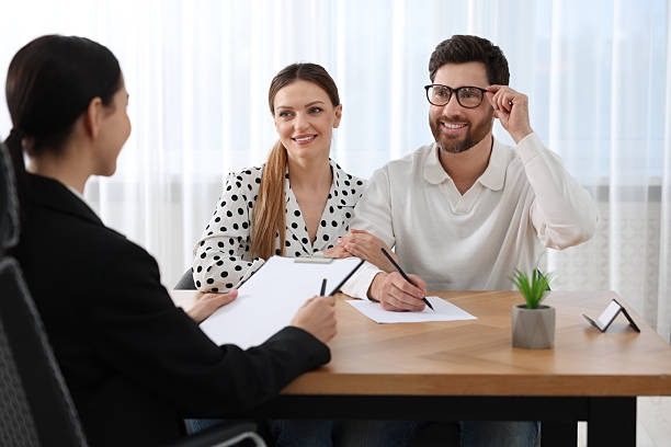 Spouses reviewing financial documents related to spousal maintenance in Texas.