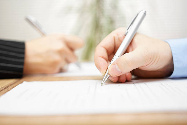 Couple reviewing a prenuptial agreement before marriage in Tarrant County, TX