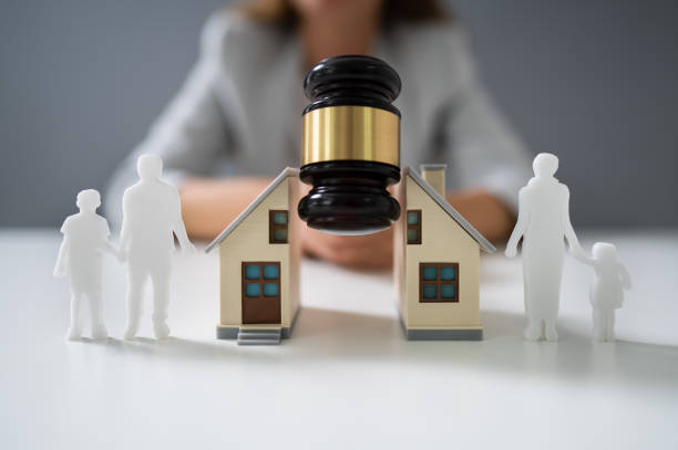 Lewisville divorce attorney discussing marital property and asset division with a client